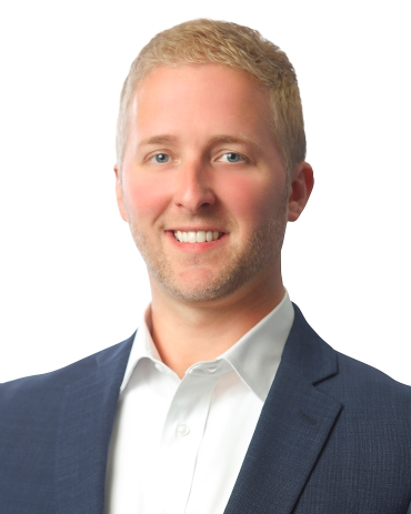 Scott Donnelly, Partner at The Bonadio Group seen posing for a photo with a smile on his face